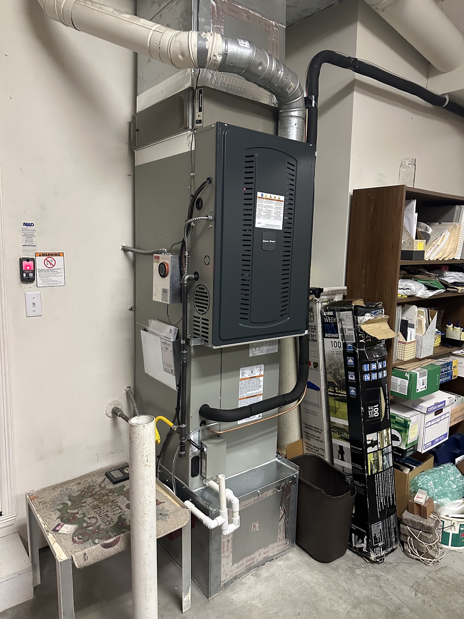 Dual-fuel American Standard gas furnace paired with a heat pump installed by GreenFlow in Bonney Lake after a gas leak forced a full system replacement