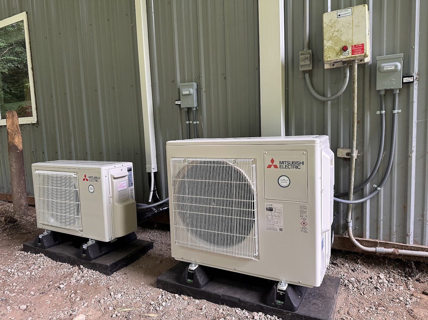 Mitsubishi Electric dual-zone and single-zone ductless mini-split installed on a mixed-use building in Olympia