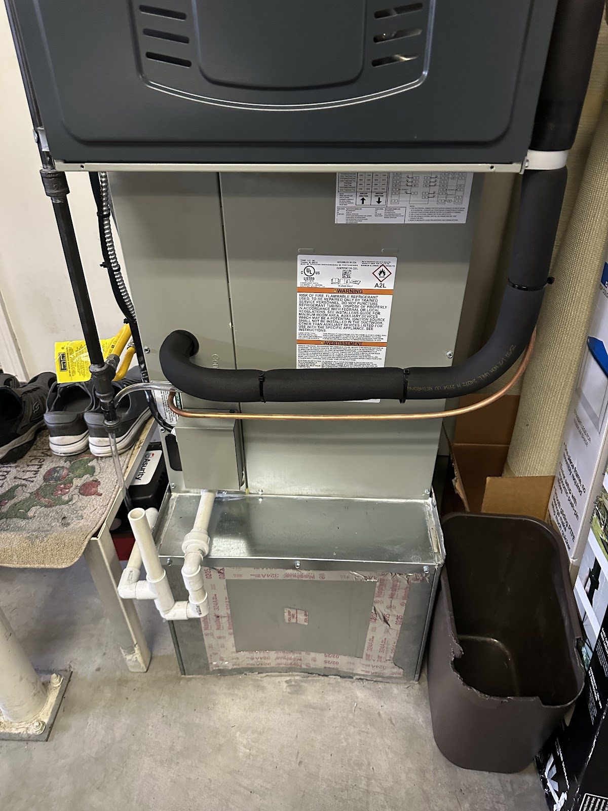 Mitsubishi vertical air handler installed in a mechanical closet