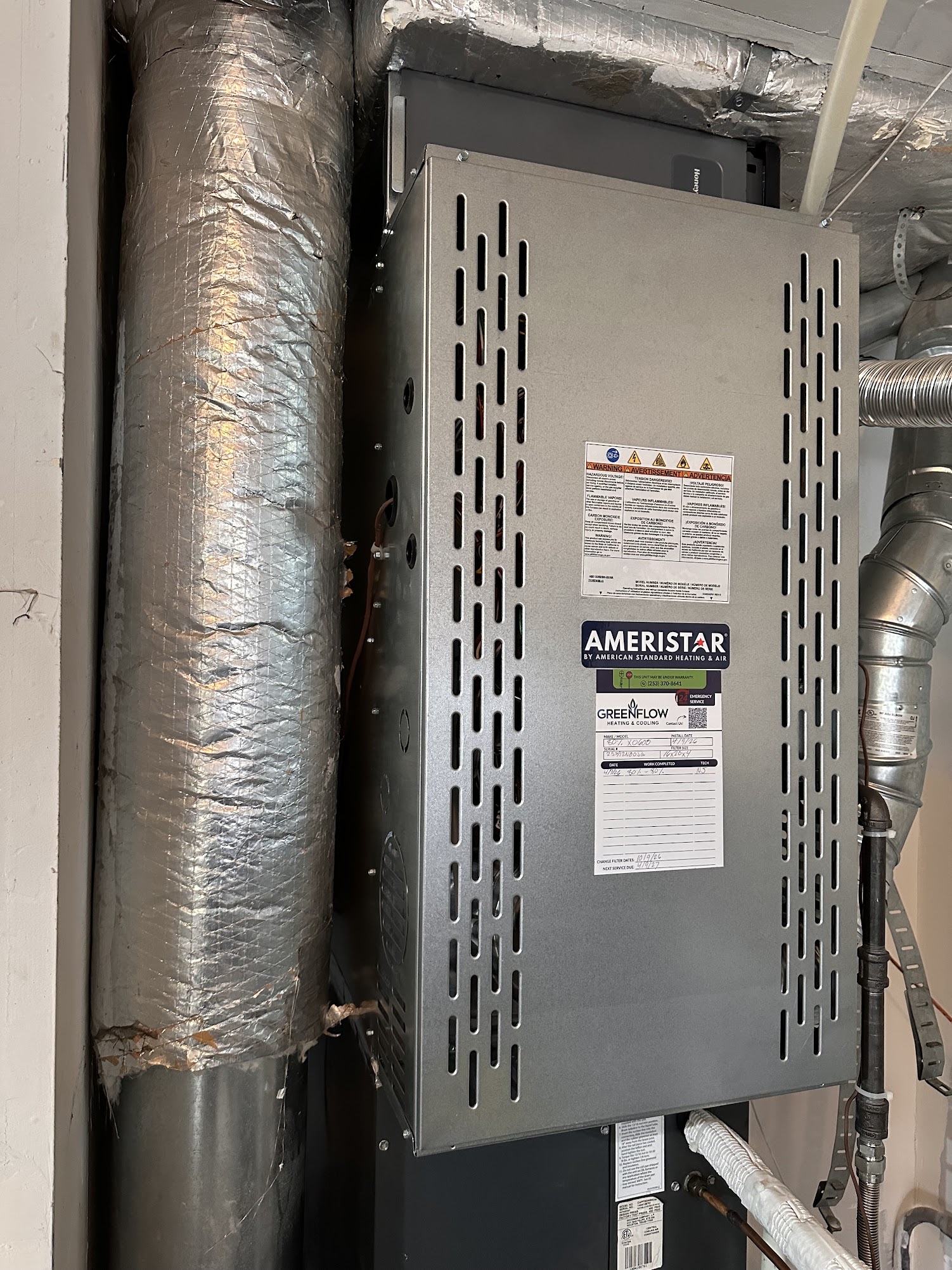 Ameristar gas furnace installed by GreenFlow in Olympia after water heater flood damage, handled through the warranty program