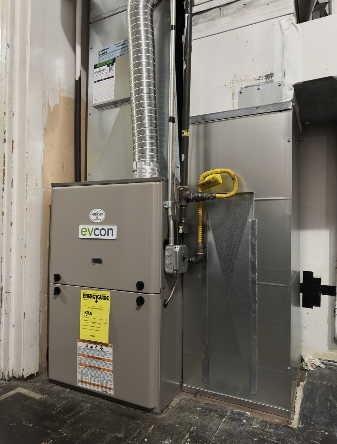 New efficient Evcon gas furnace installed by GreenFlow in North Tacoma to replace a 55 year old GE furnace