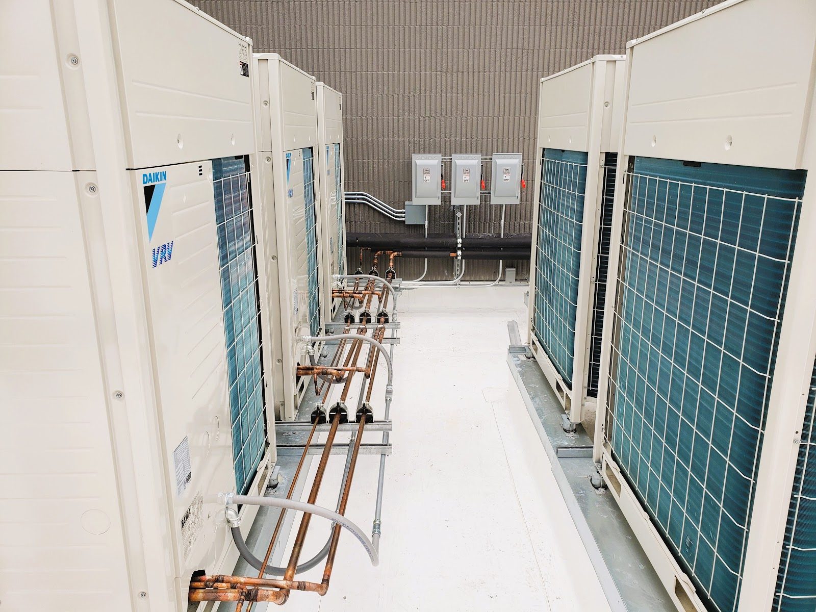 Daikin VRV commercial multi-zone heat pump system with copper refrigerant loops